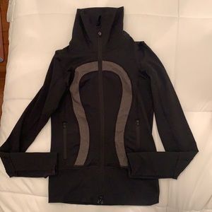 Lululemon Athletica zip -up jacket. US size 2. Black with grey emblem.